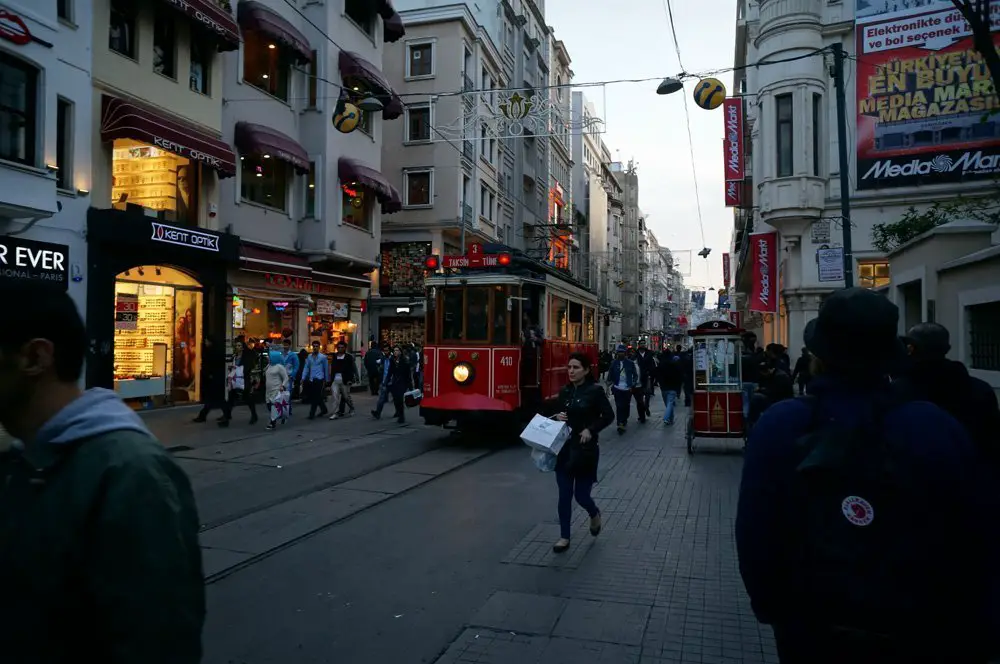 The chaos of Istiklal with the tram in the background.