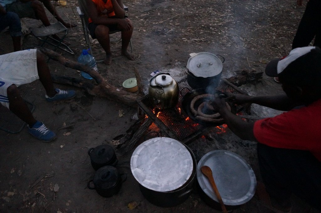 The cook making us some boerewors in the Okavango Delta