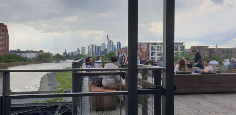 Having an amazing drink at Oosten with views of Frankfurt