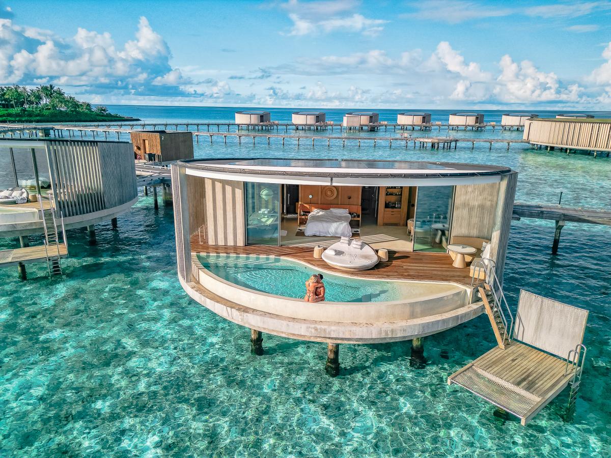 ritz carlton maldives overwater villa drone