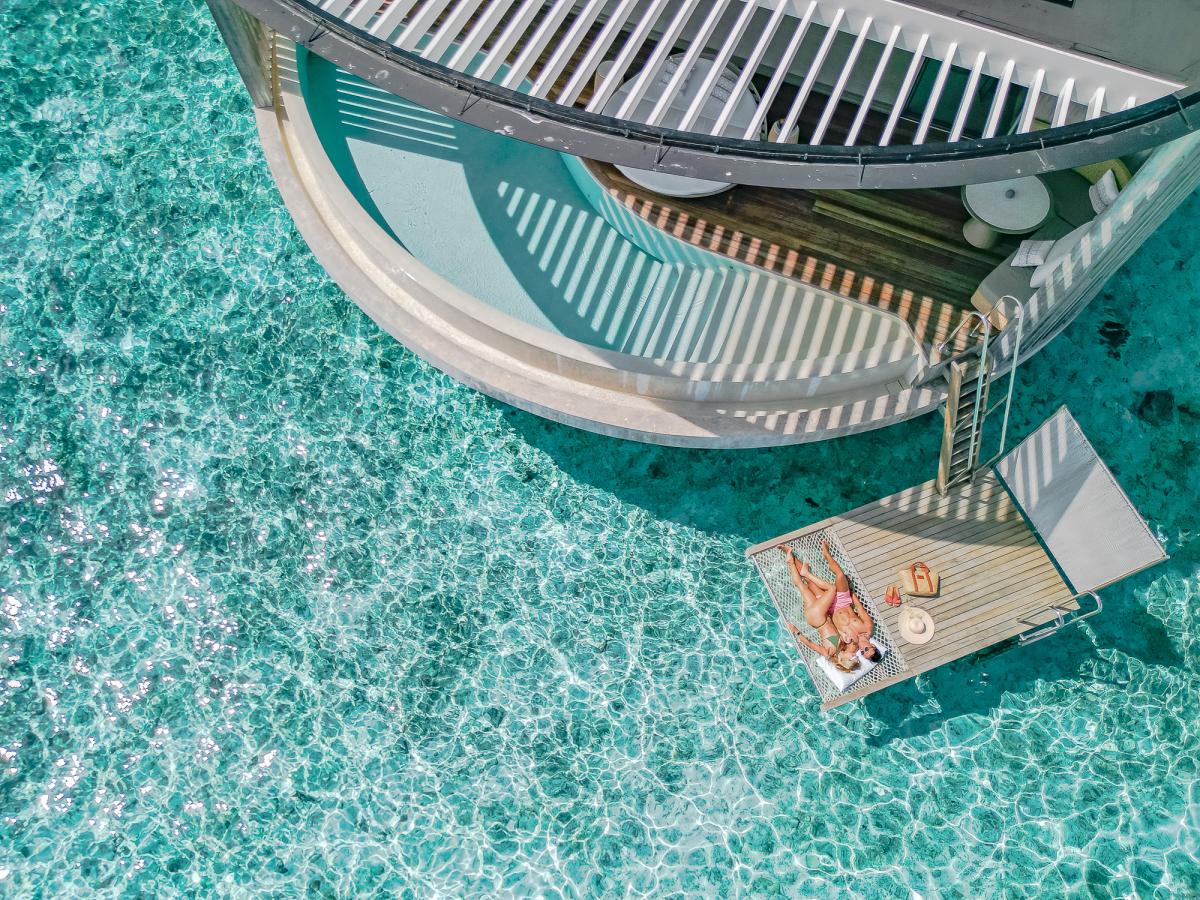 Net bed ritz carlton maldives drone shot