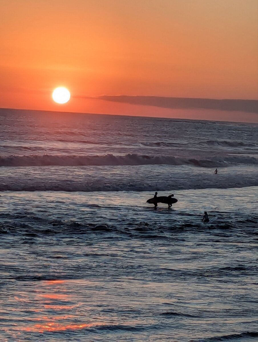 canggu bali sunset surfer